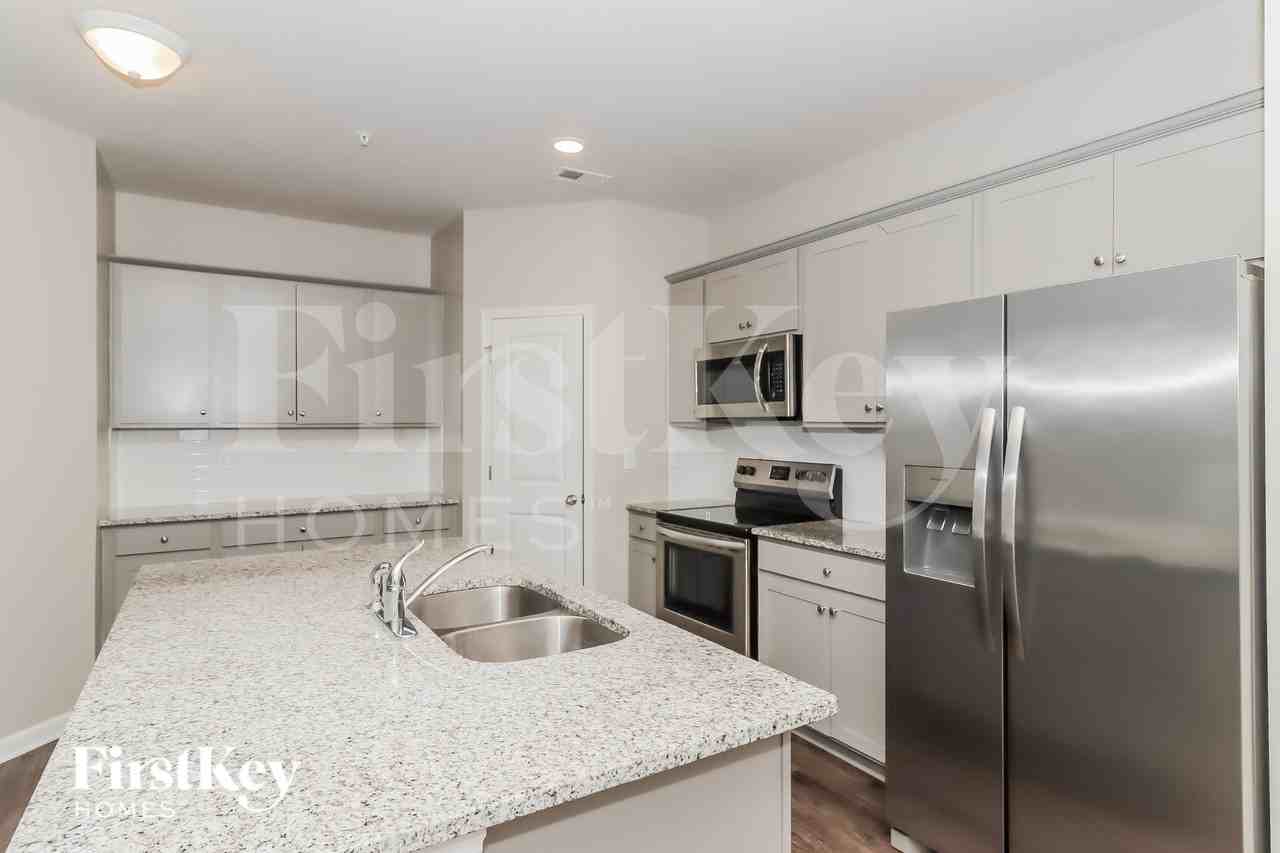 9419 Village View Ct Nw - Photo 7 of 16