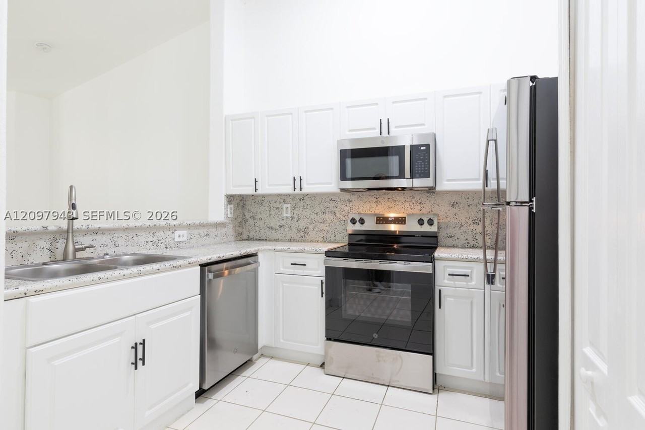 1663 Se 27th Dr #208 - Photo 3 of 11