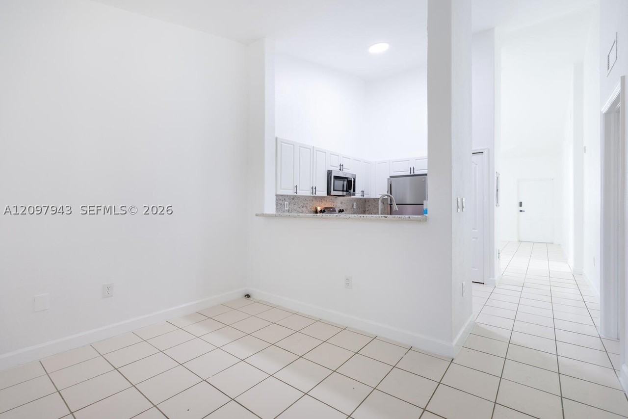 1663 Se 27th Dr #208 - Photo 4 of 11