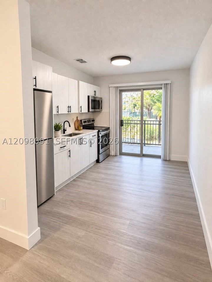519 Nw 10th Ave #3 - Photo 6 of 9