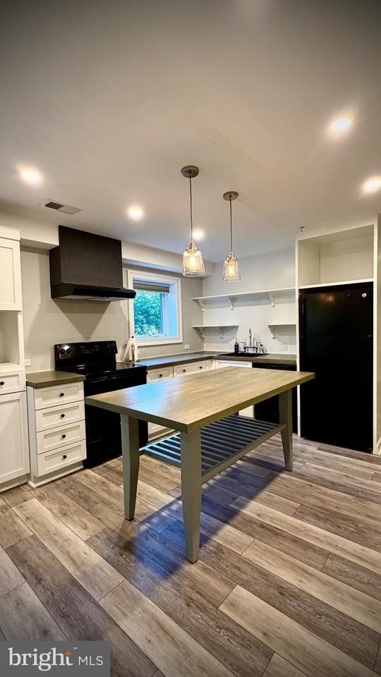 4874 Sudley Rd - Photo 4 of 11