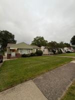 featured image of 15317 Steinway Blvd #1