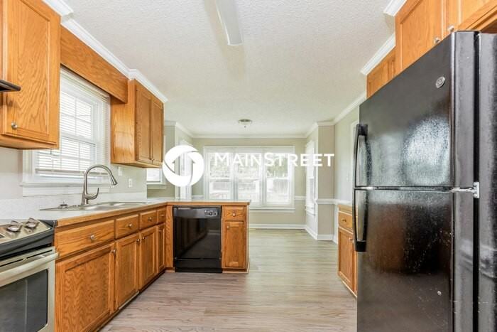 9909 Huntwyck Dr - Photo 5 of 16