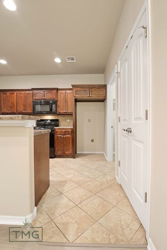 10515 N 139th East Ave - Photo 5 of 22