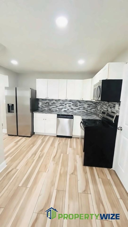 7113 Liberty Rd #1 - Photo 6 of 31
