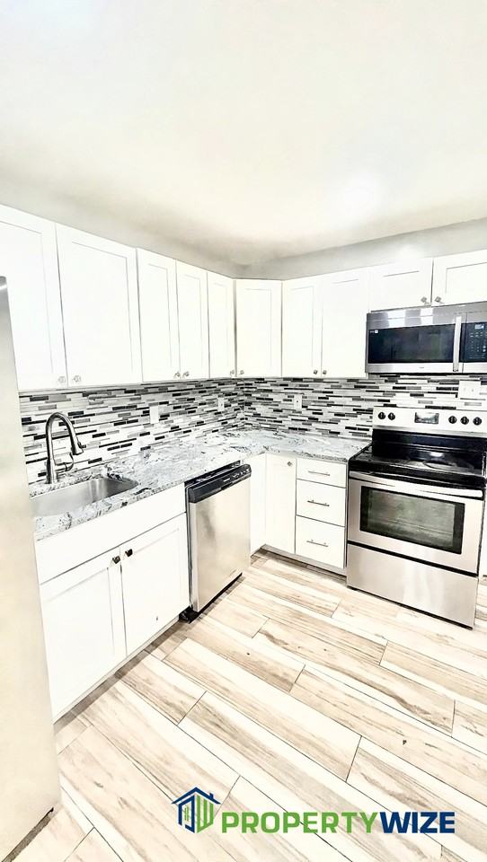 7113 Liberty Rd #1 - Photo 5 of 31