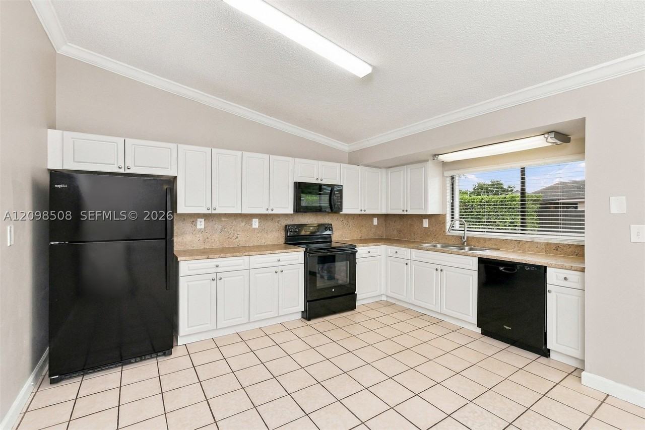 6671 Nw 199th St - Photo 7 of 15
