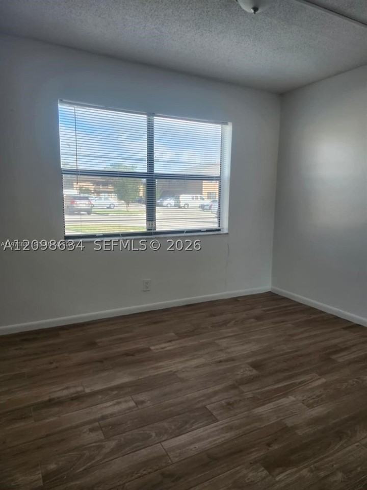 10037 Winding Lake Rd #102 - Photo 4 of 9