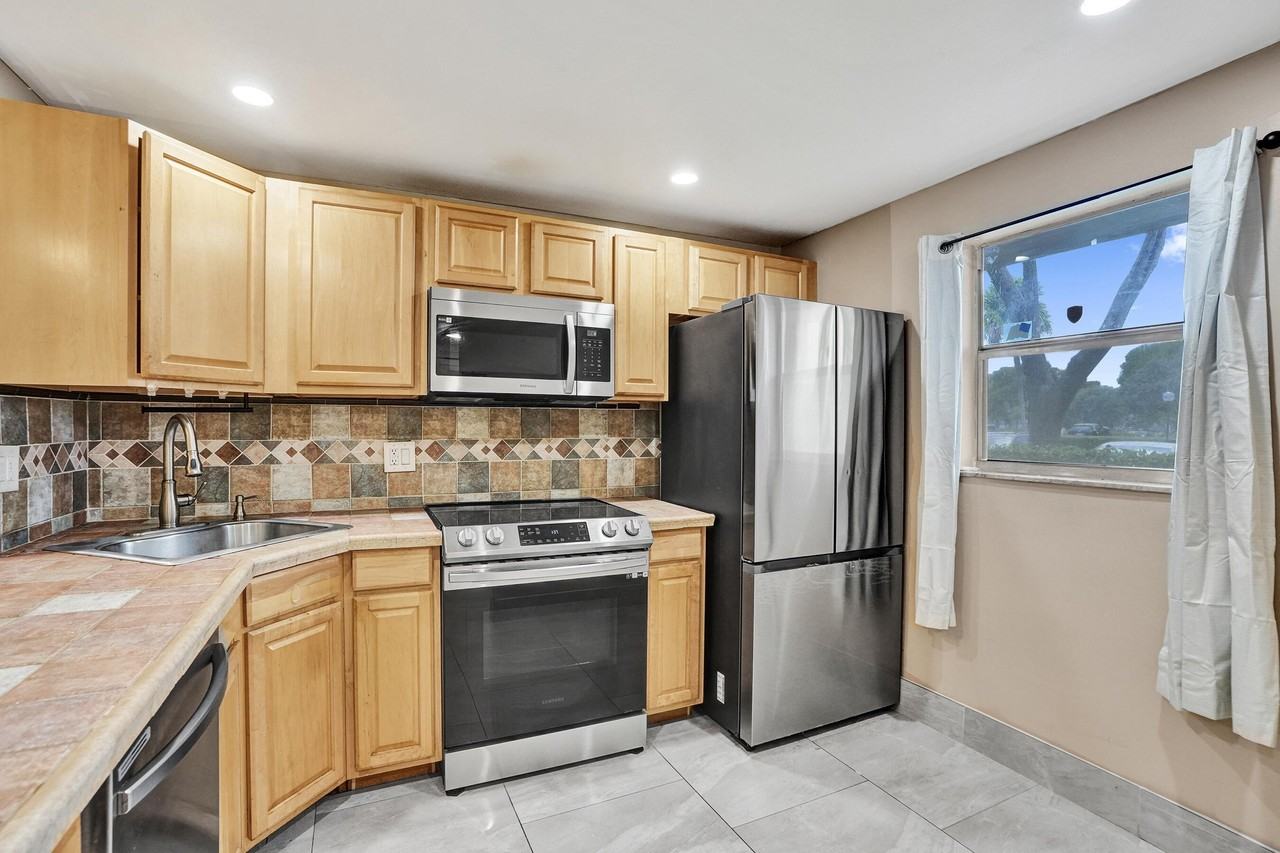 8301 Sands Point Blvd #S102 - Photo 4 of 33