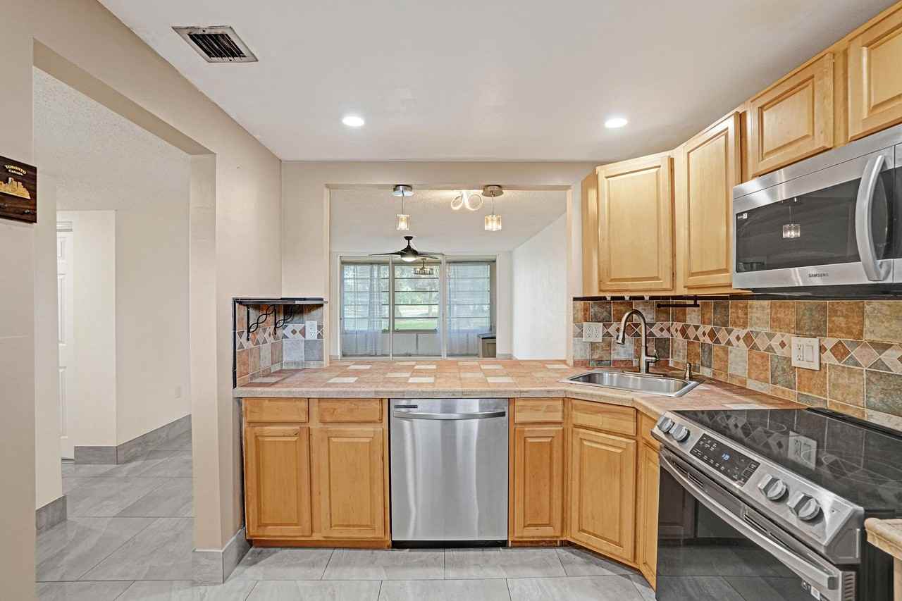 8301 Sands Point Blvd #S102 - Photo 5 of 33
