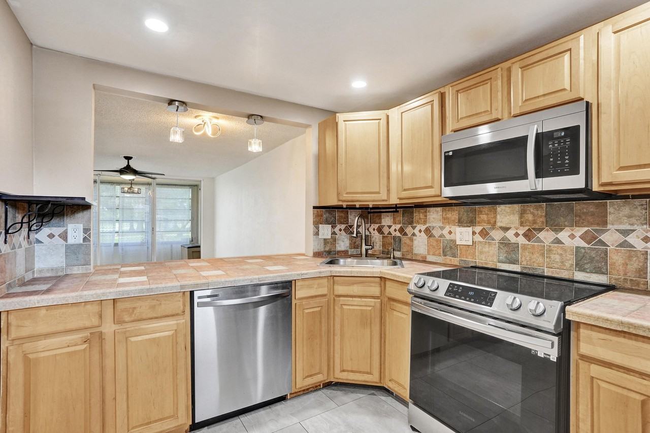 8301 Sands Point Blvd #S102 - Photo 6 of 33