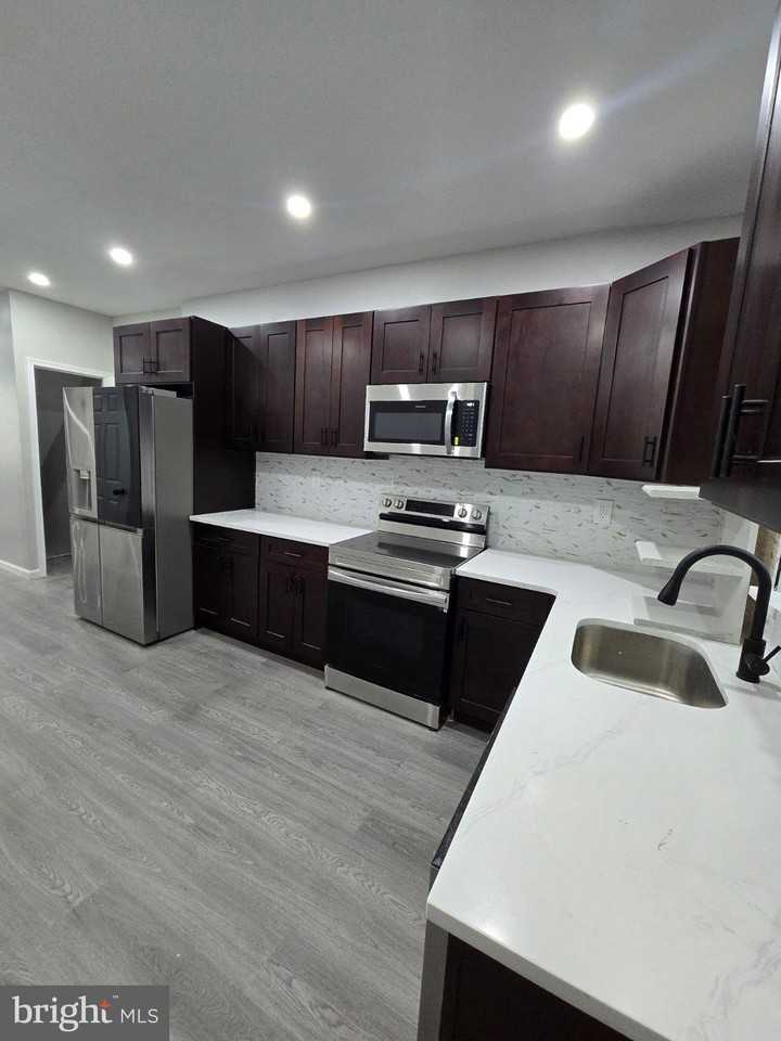 1615 S Conestoga St - Photo 3 of 7