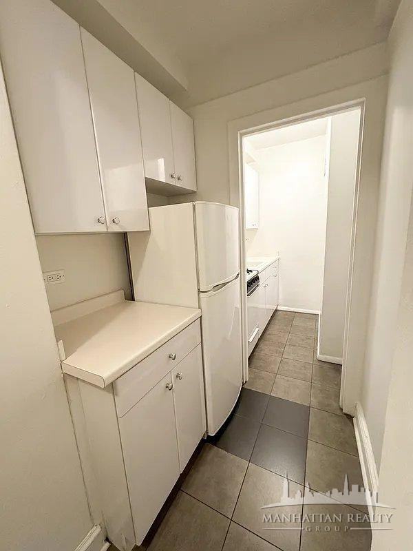 E 39th St #16 - Photo 3 of 4