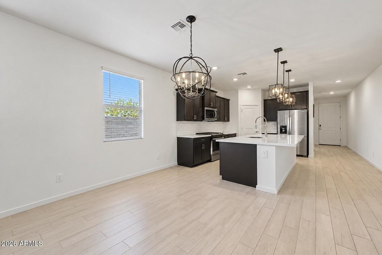 16033 W Cottontail Ln - Photo 4 of 26
