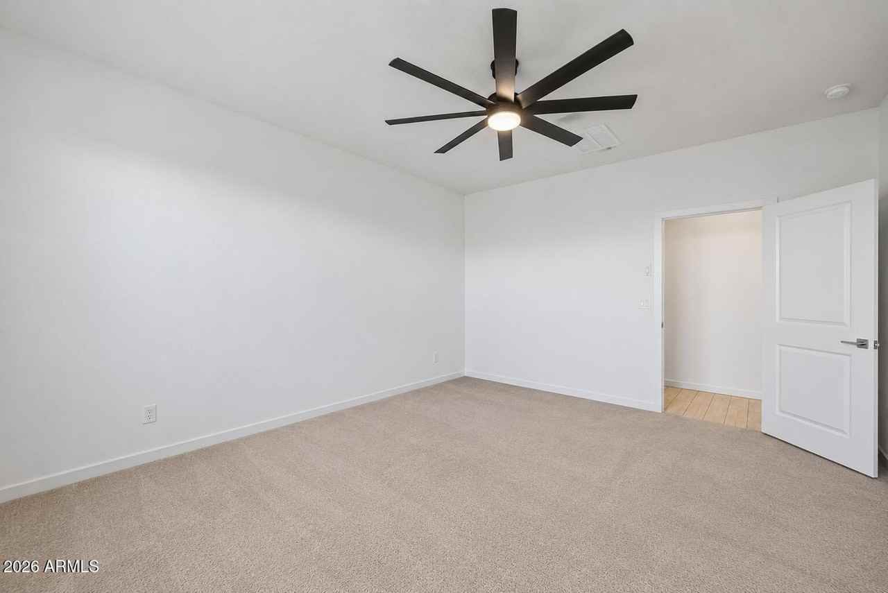 16033 W Cottontail Ln - Photo 7 of 26
