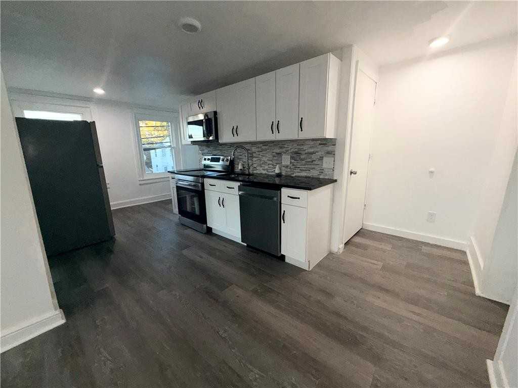 6064 Main St ##2 - Photo 4 of 11