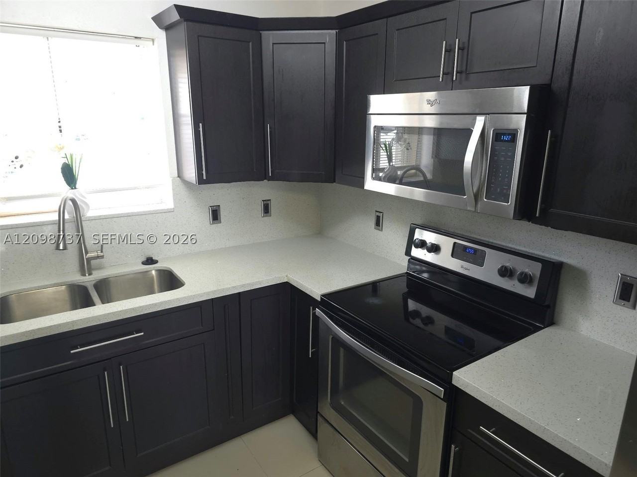7785 W 30th Ct #F107 - Photo 4 of 13