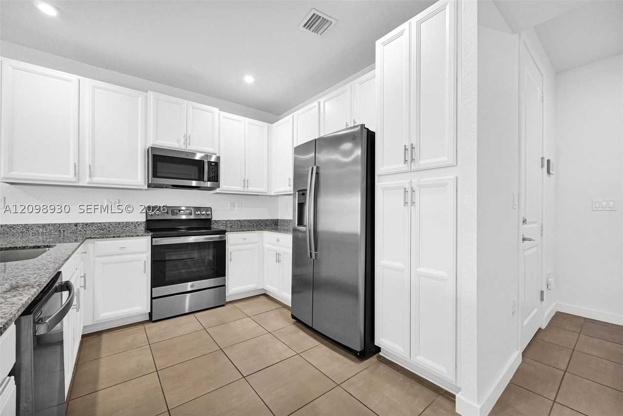 10817 Sw 233rd St - Photo 2 of 50