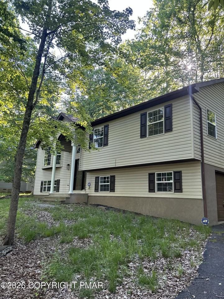 1147 Hunters Woods Dr - Photo 2 of 44