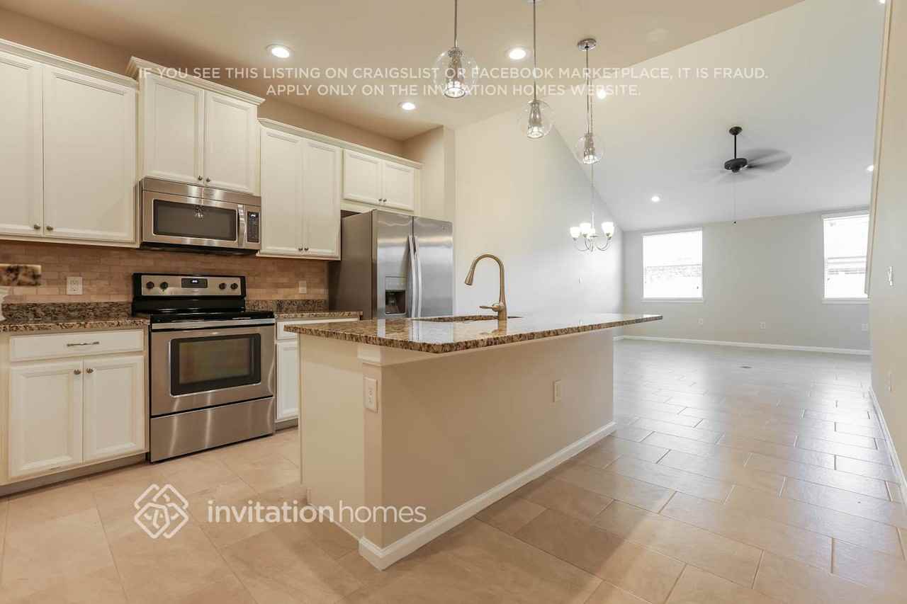 11914 Meadowgate Pl - Photo 6 of 16