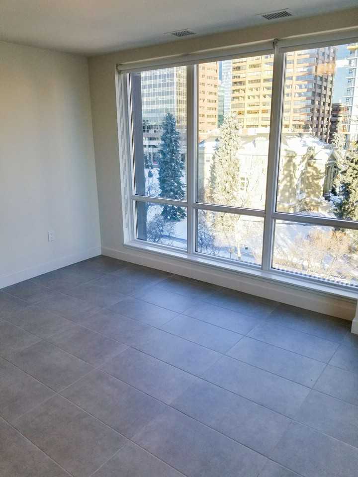 303 13 Ave Sw - Photo 3 of 11