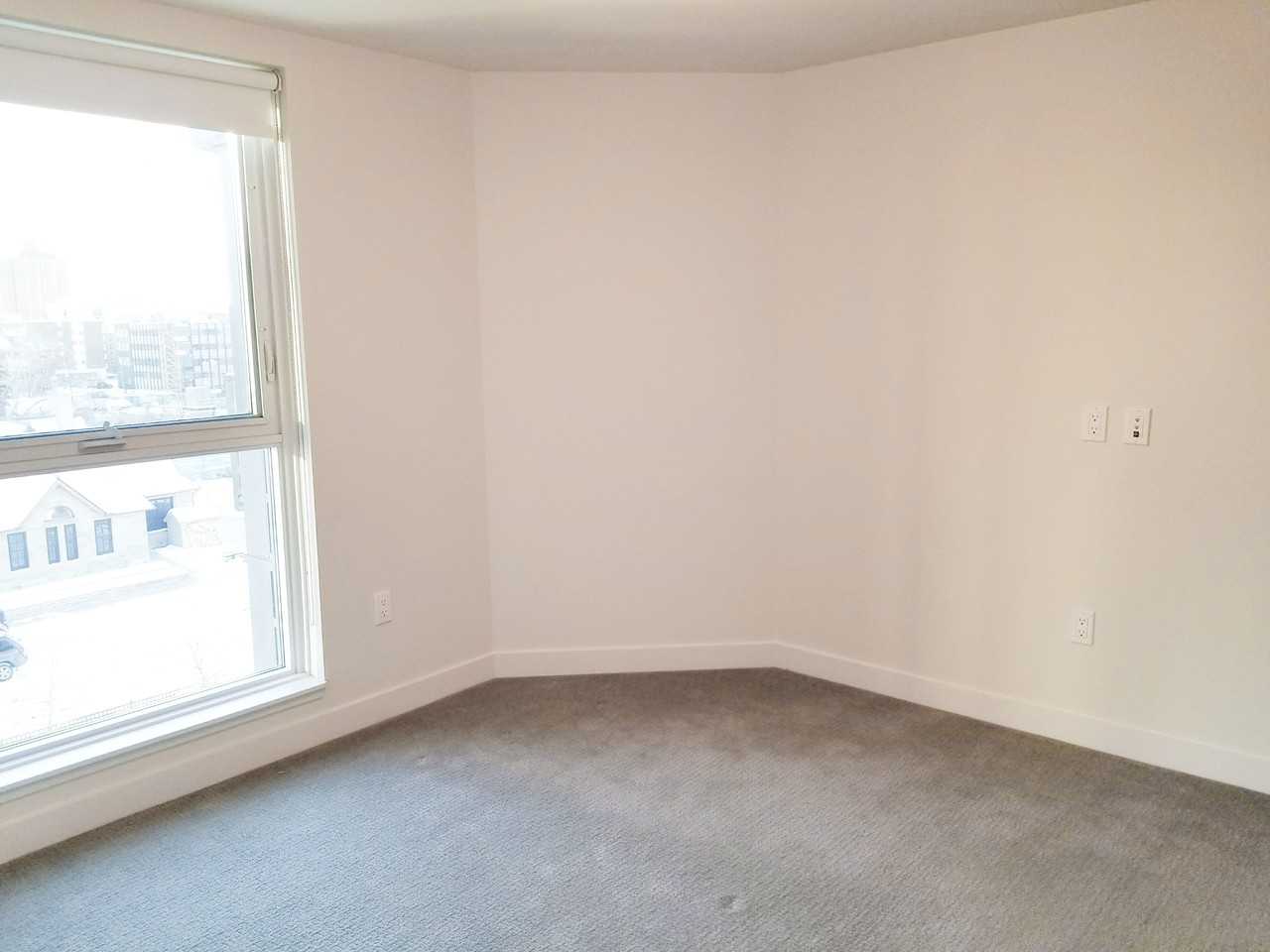 303 13 Ave Sw - Photo 7 of 11