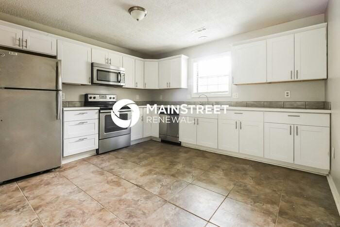 2913 Wallace Ave - Photo 4 of 16