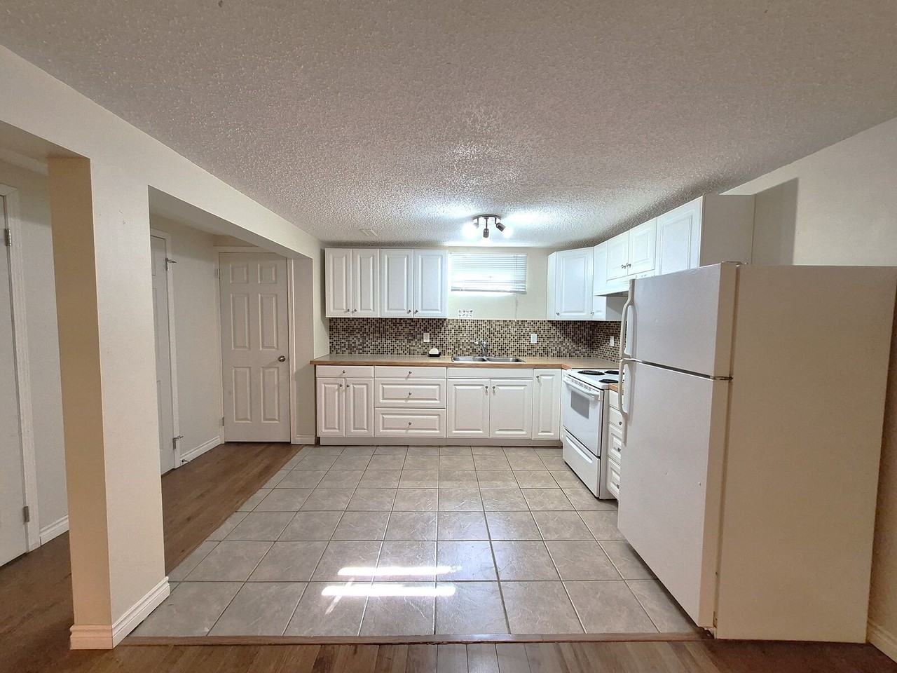 3939 14 Ave Ne - Photo 3 of 19