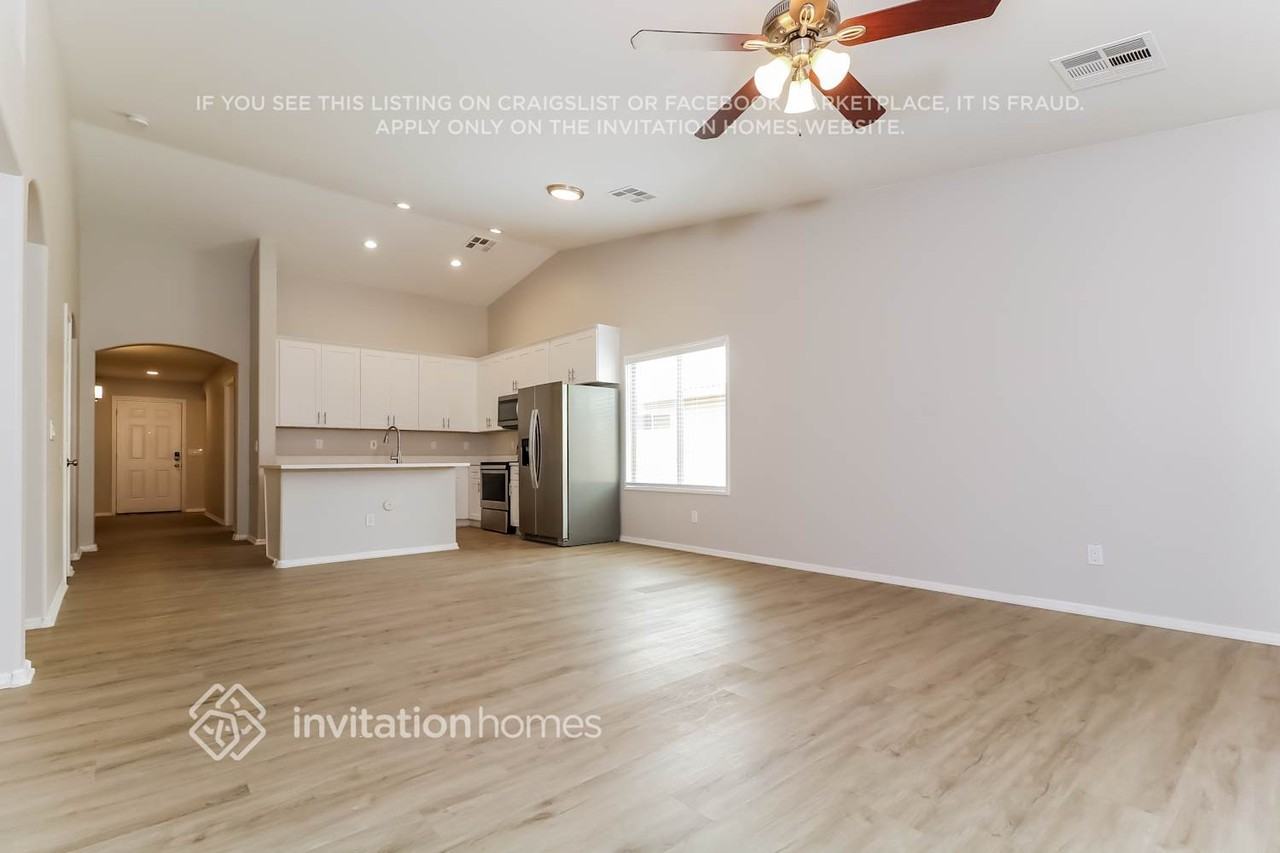 10613 W La Reata Ave - Photo 5 of 16