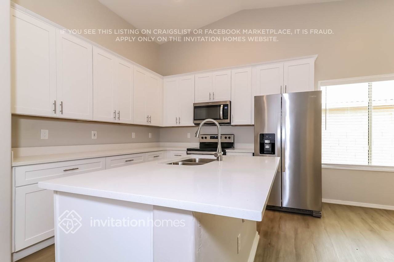 10613 W La Reata Ave - Photo 6 of 16