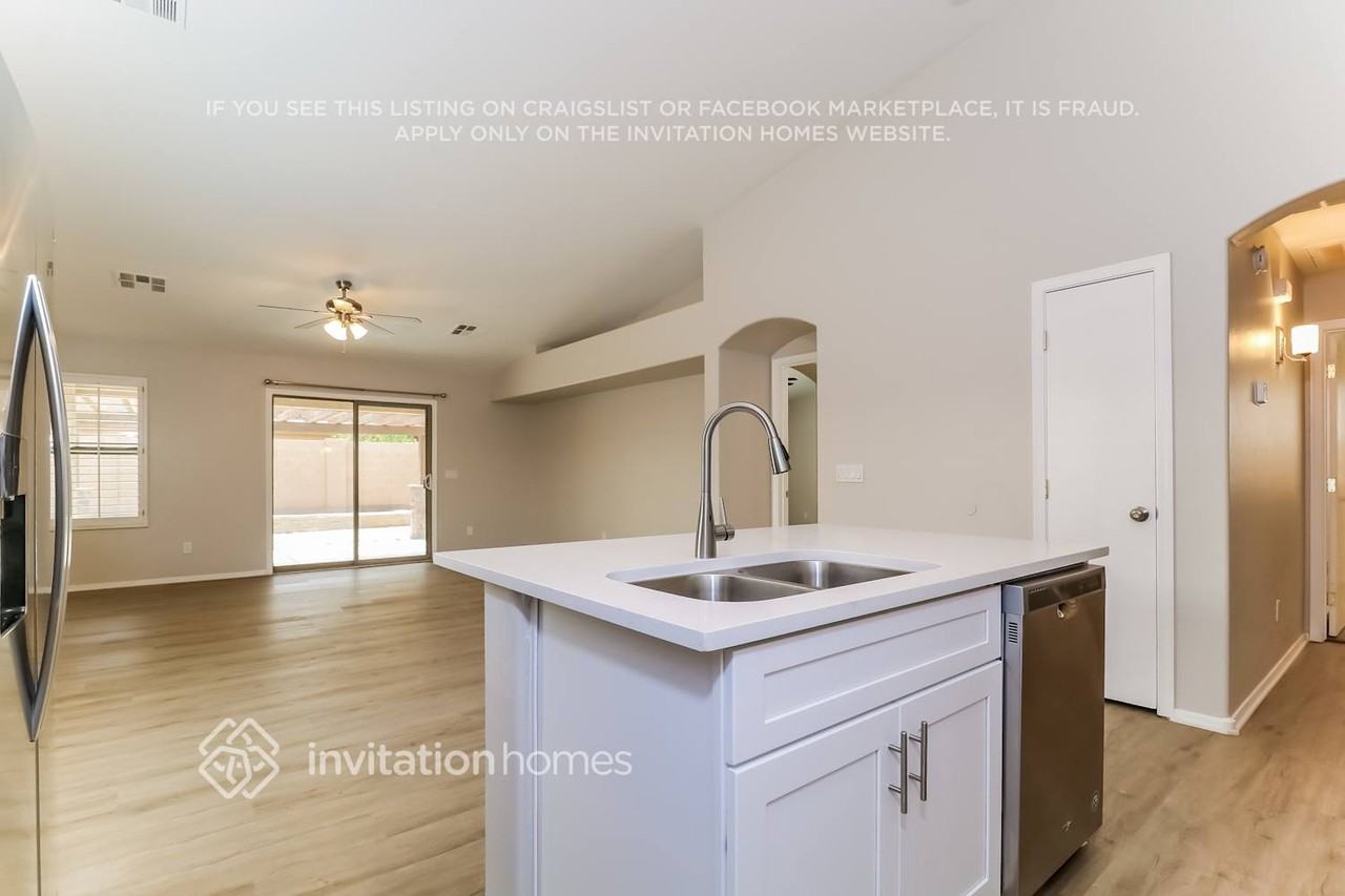 10613 W La Reata Ave - Photo 7 of 16