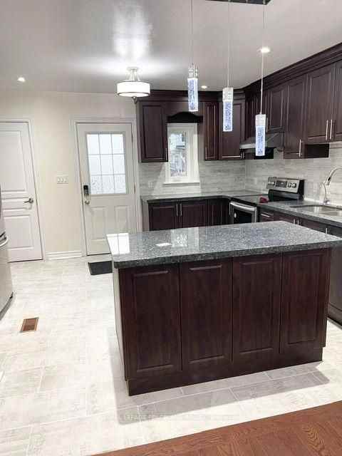 606 Coxwell Avenue - Photo 6 of 15
