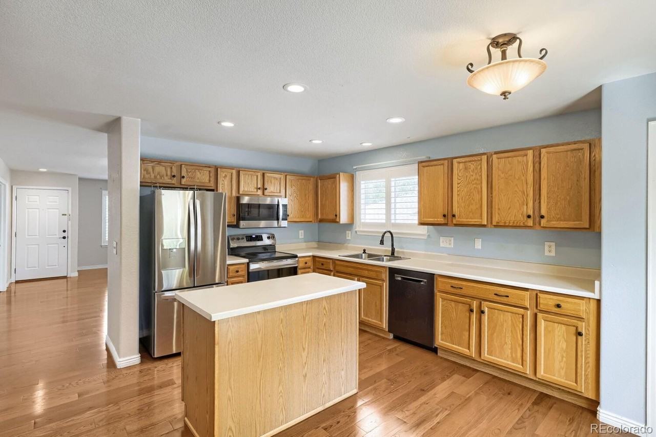 5556 S Rome St #1 - Photo 6 of 20