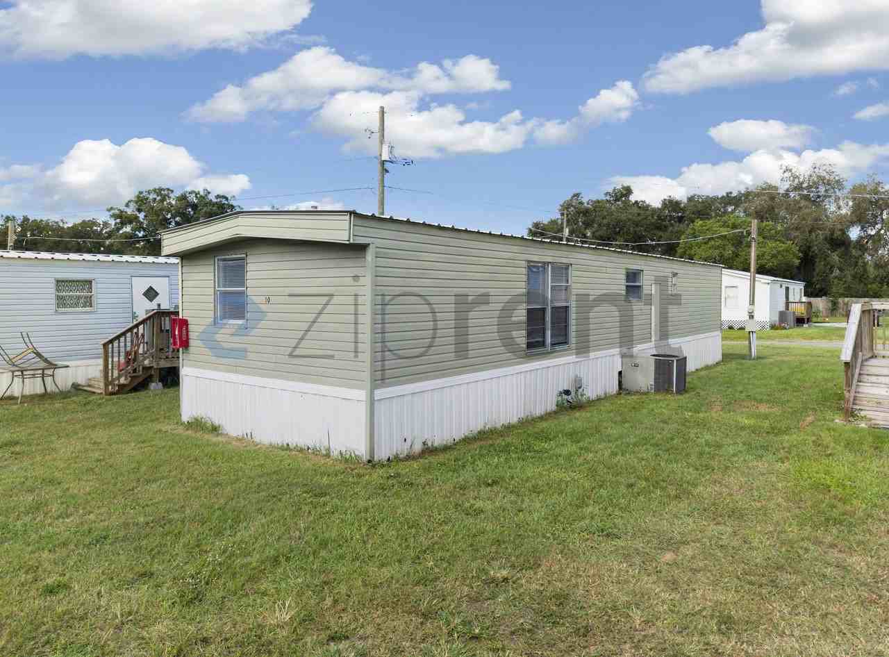 10726 Skewlee Rd - Photo 4 of 15