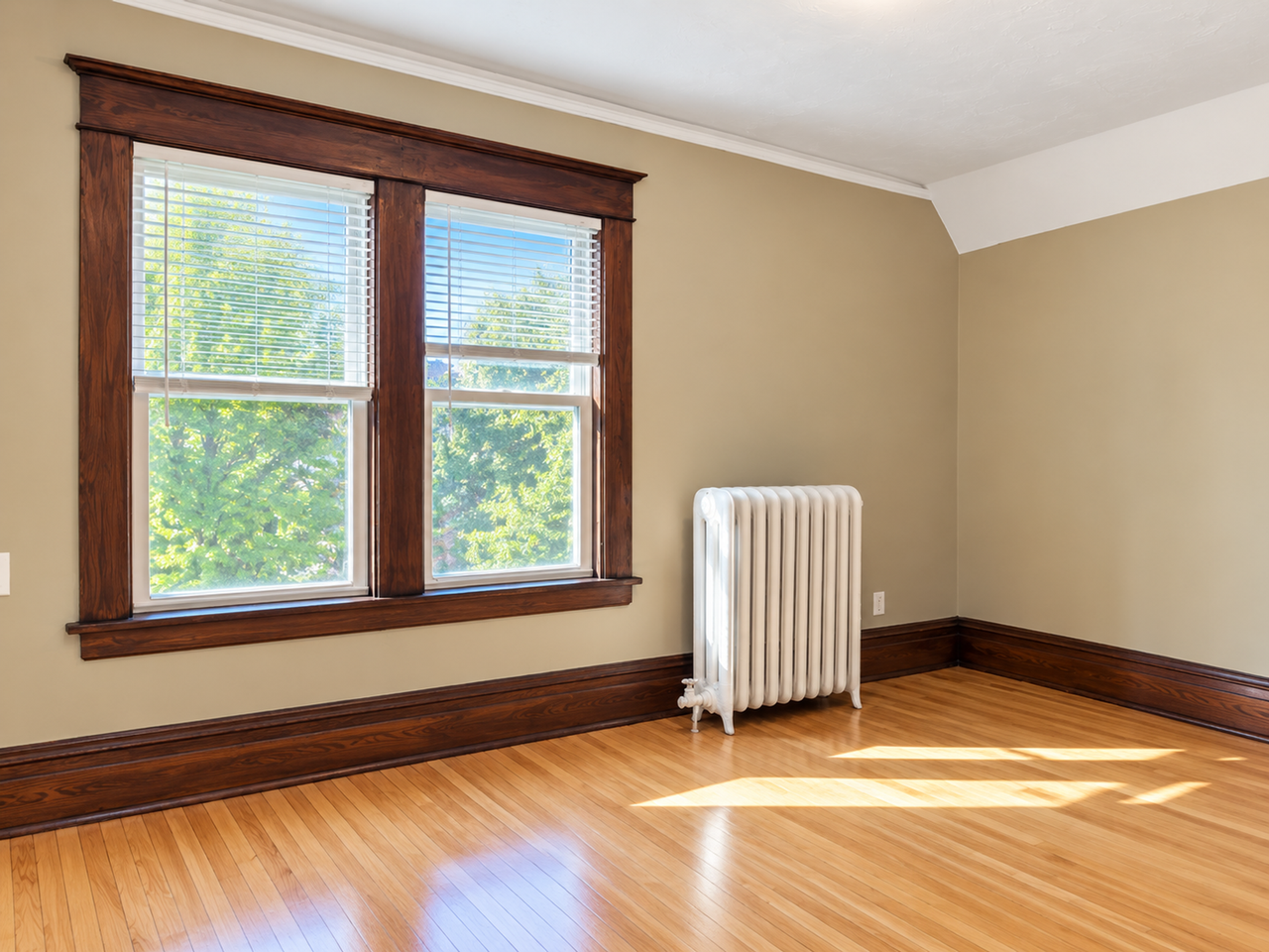 Charming Duplex Near West 7th – Hardwood Floors, Porch & Garage! - Photo 6 of 16