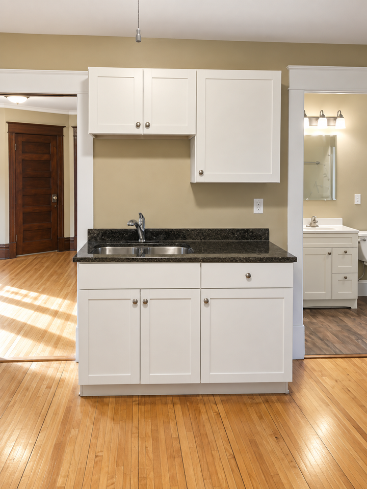 Charming Duplex Near West 7th – Hardwood Floors, Porch & Garage! - Photo 7 of 16