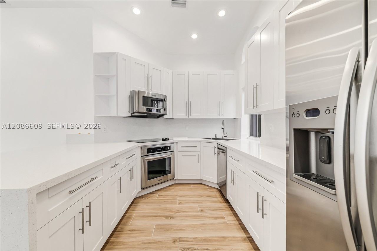 1290 Seagrape Cir - Photo 2 of 50