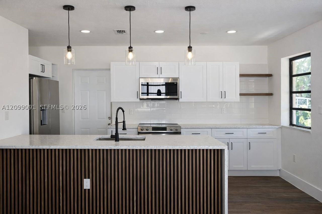 1950 Nw 57th St - Photo 4 of 12