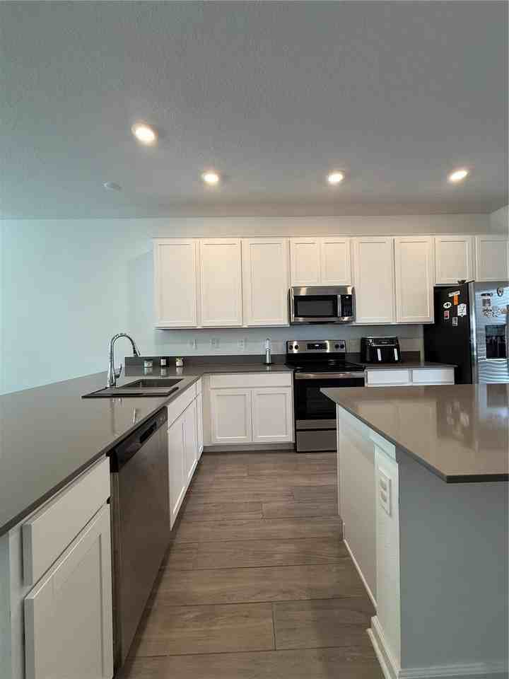15821 Water Spring Blvd - Photo 7 of 18