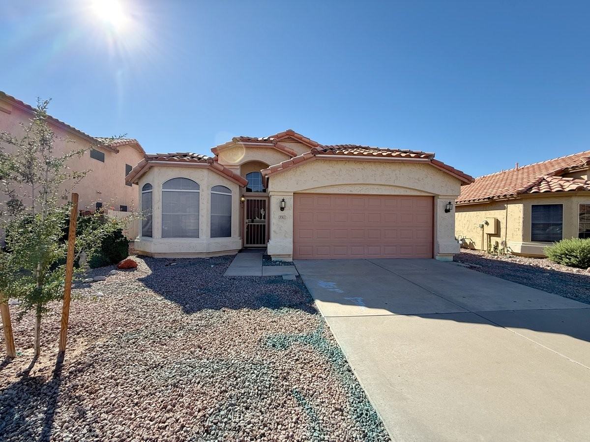 9765 W Yukon Dr - Photo 2 of 38