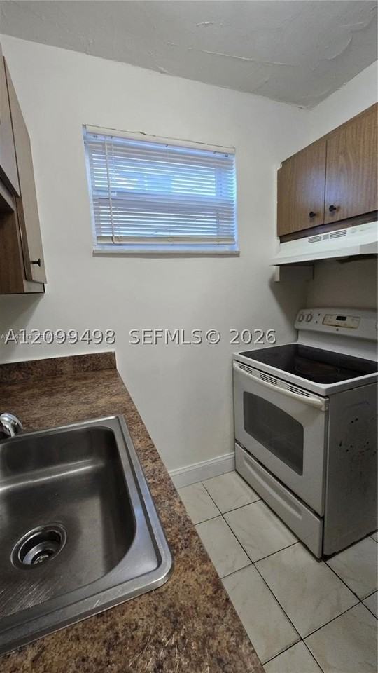 1590 Ne 125th Ter #3 - Photo 4 of 8