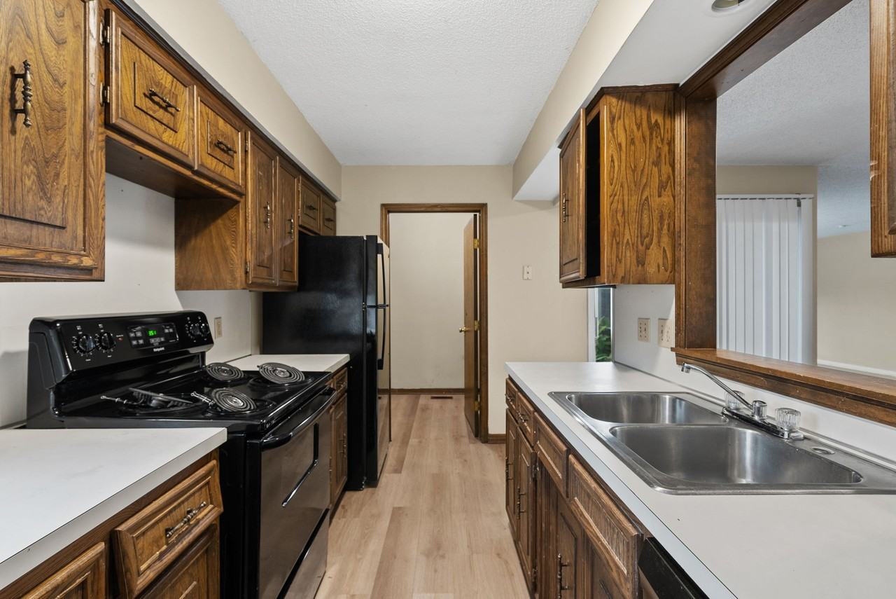 Rustic Woods Townhomes - Photo 7 of 16