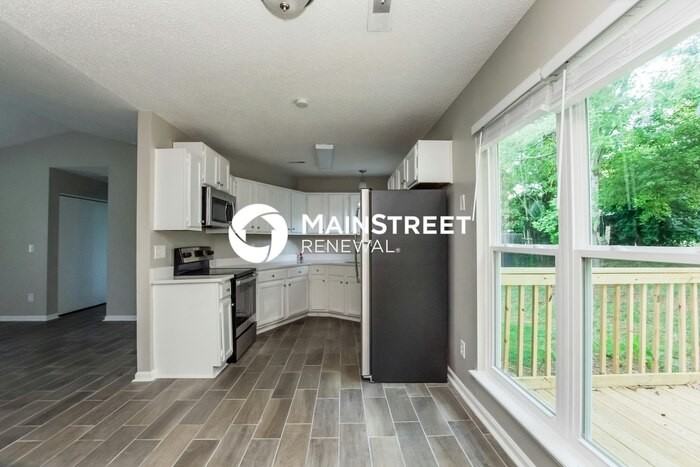 8834 Royal Scot Ln - Photo 5 of 16