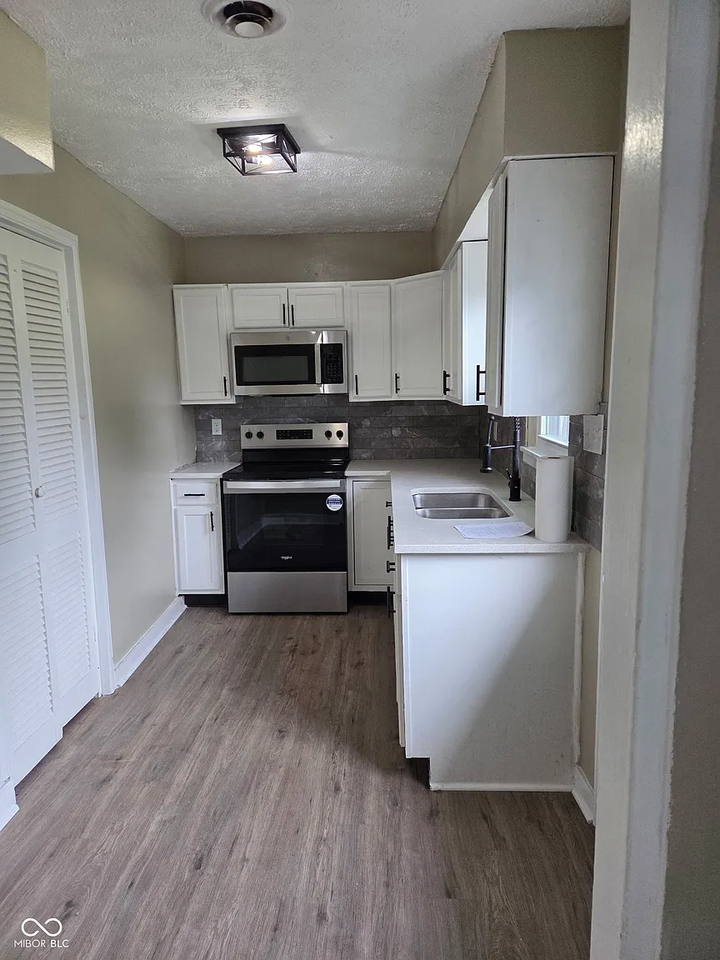 6174 Raleigh Dr - Photo 5 of 13