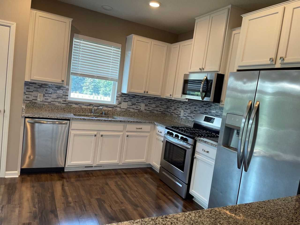9579 Olive Ln N - Photo 5 of 10