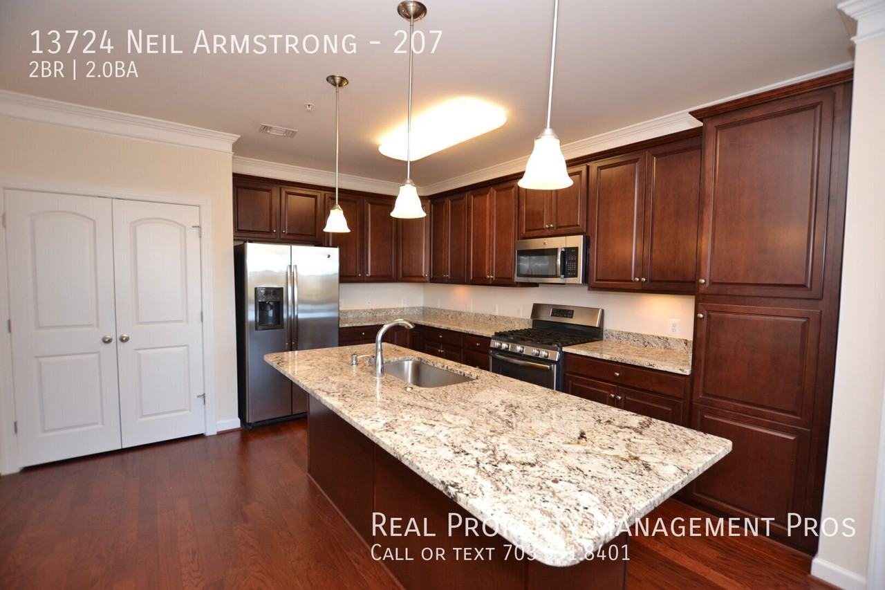 13724 Neil Armstrong Ave #207 - Photo 2 of 29