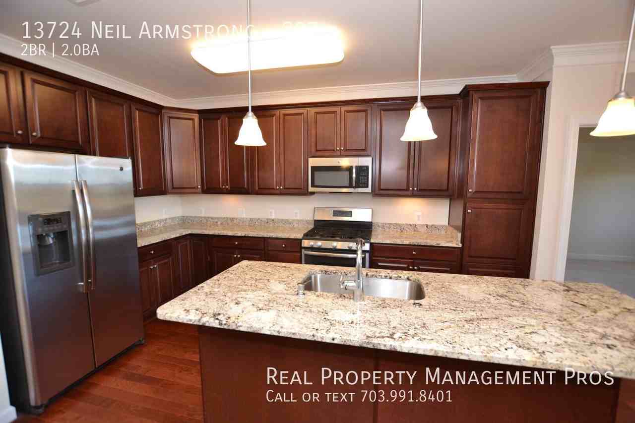 13724 Neil Armstrong Ave #207 - Photo 3 of 29