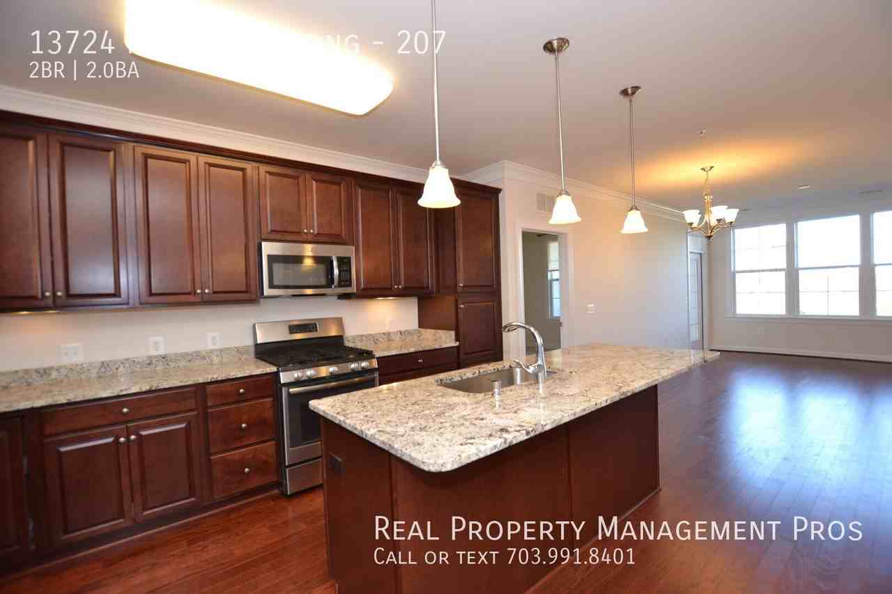 13724 Neil Armstrong Ave #207 - Photo 4 of 29