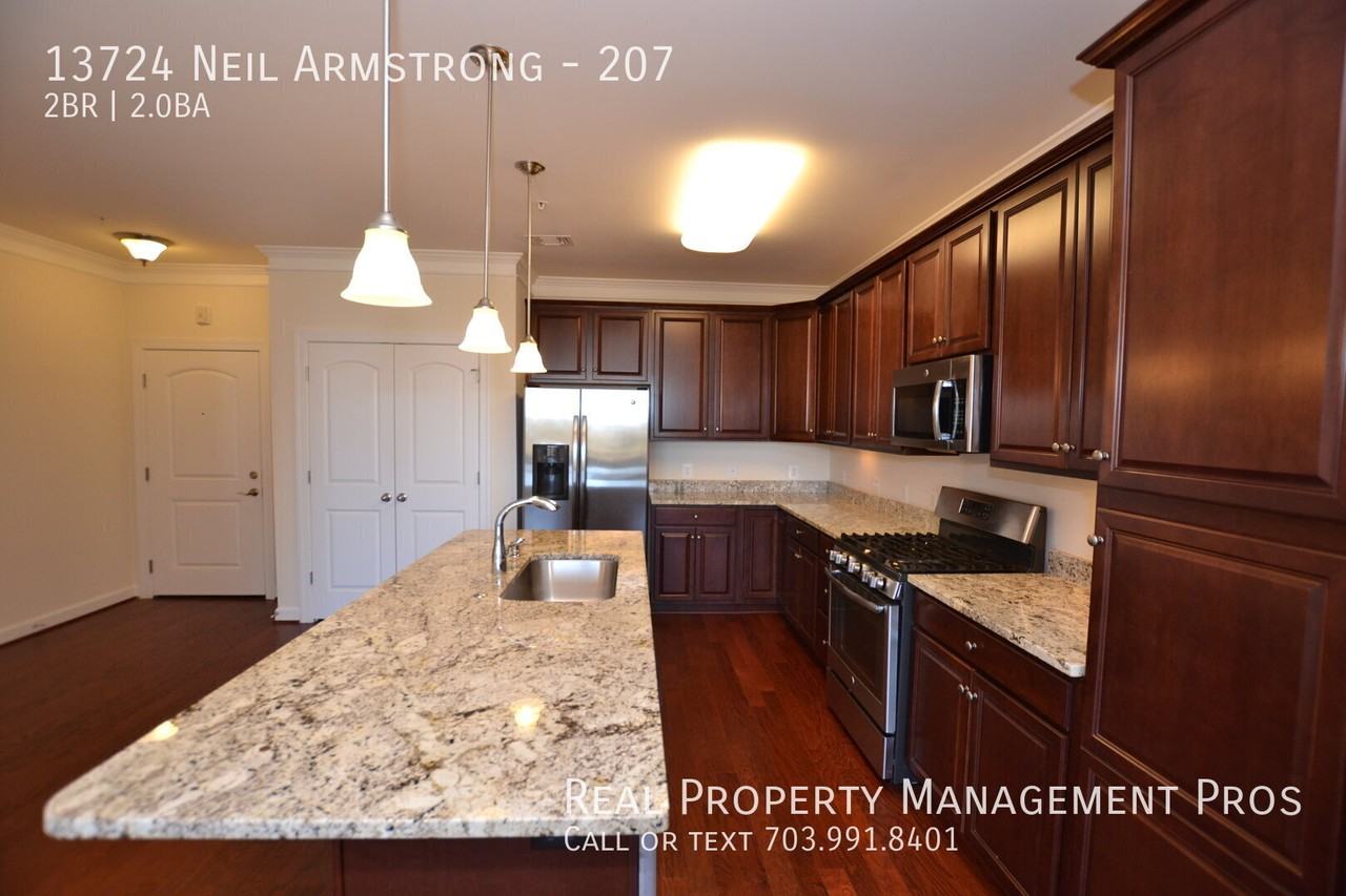 13724 Neil Armstrong Ave #207 - Photo 5 of 29
