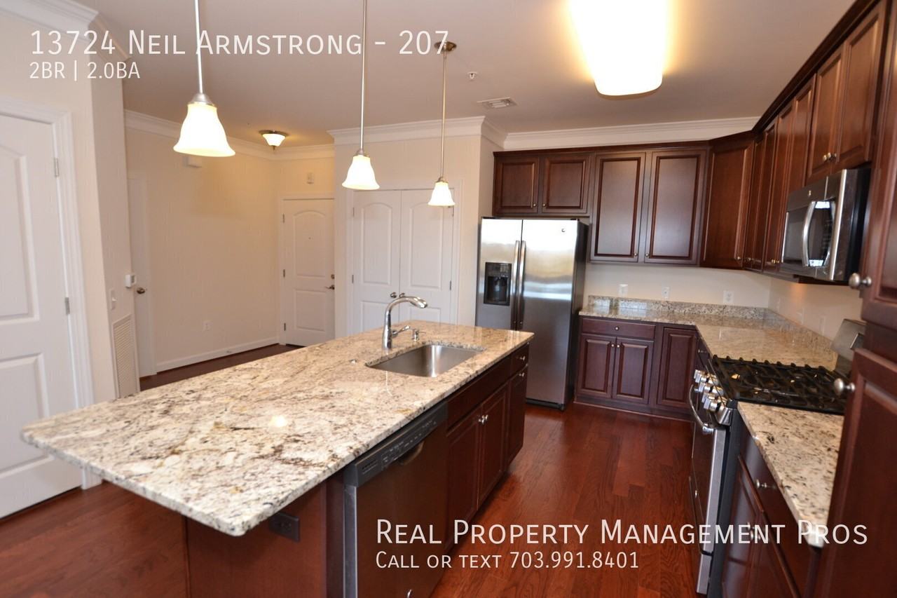 13724 Neil Armstrong Ave #207 - Photo 6 of 29